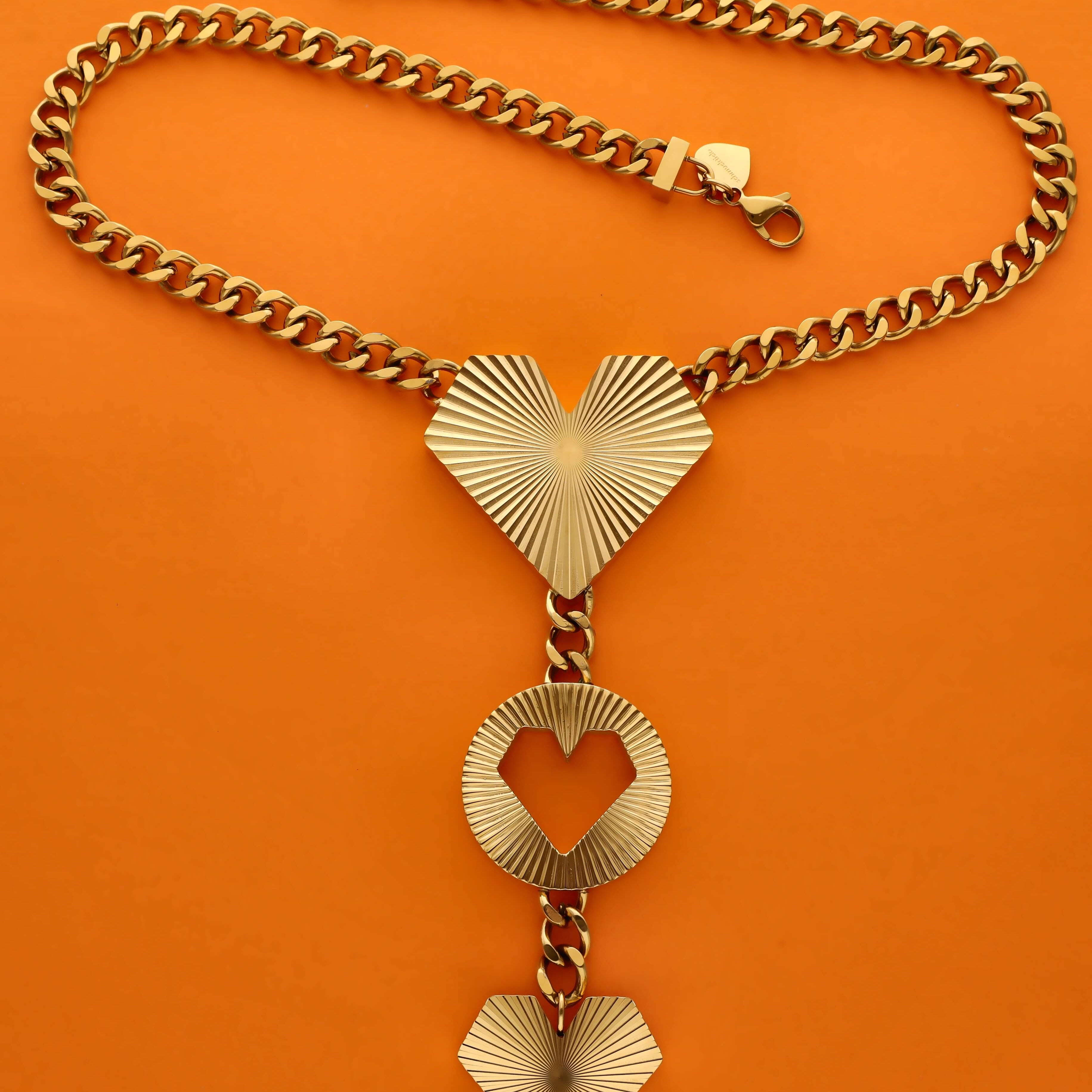 Produktbild Goldene HEARTCORE Statement-Kette 45 cm mit drei geometrischen Herz-Anhängern Edelstahl mit cuban chain