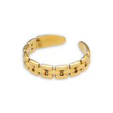 Ring UMA in Gitteroptik aus vergoldetem Edelstahl, größenverstellbar. 